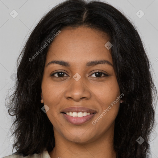 Joyful black young-adult female with long  brown hair and brown eyes