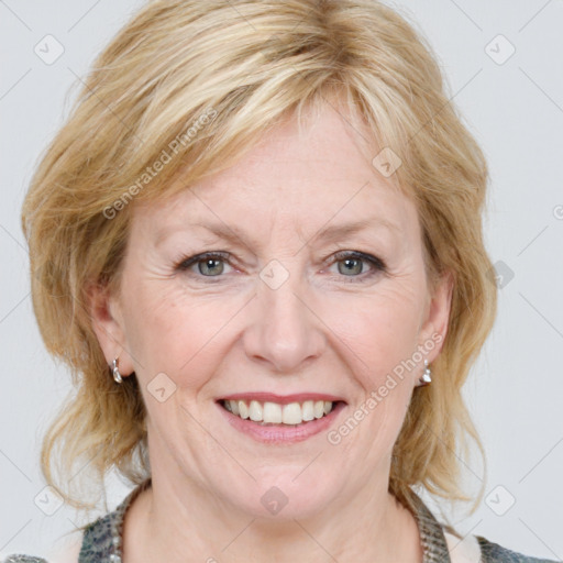 Joyful white adult female with medium  brown hair and blue eyes