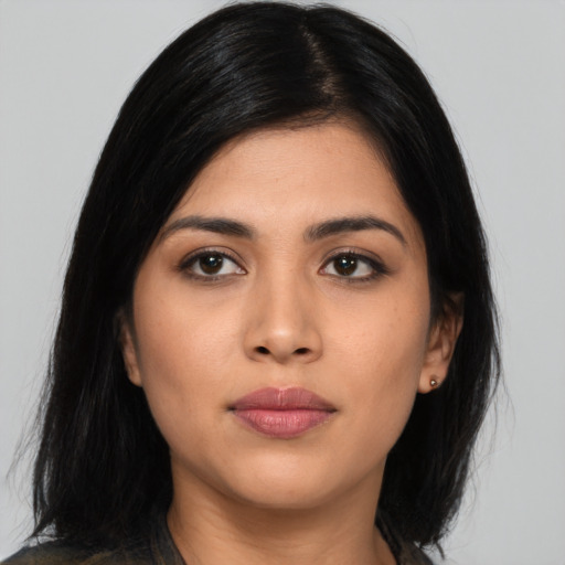 Neutral asian young-adult female with medium  black hair and brown eyes