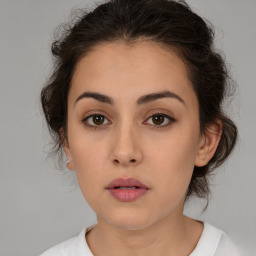 Neutral white young-adult female with medium  brown hair and brown eyes