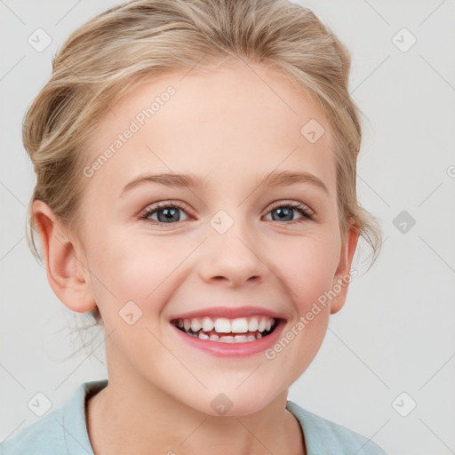 Joyful white child female with medium  brown hair and blue eyes