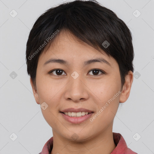 Joyful asian young-adult female with short  brown hair and brown eyes