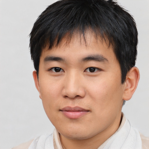 Neutral asian young-adult male with short  brown hair and brown eyes