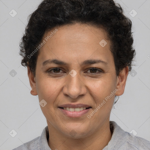 Joyful white adult female with short  brown hair and brown eyes