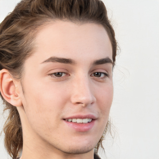 Joyful white young-adult male with medium  brown hair and brown eyes