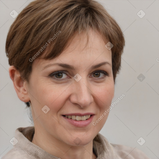 Joyful white adult female with short  brown hair and grey eyes