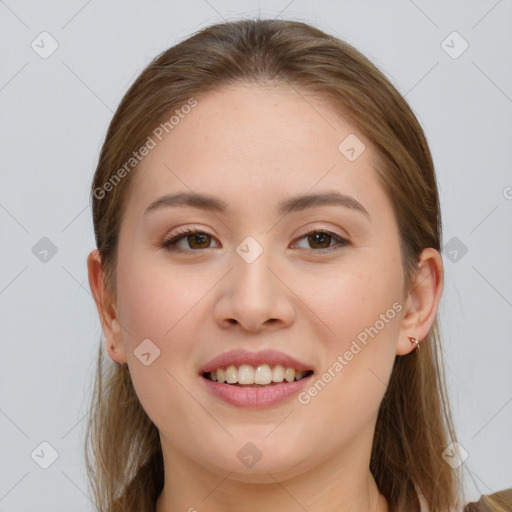 Joyful white young-adult female with long  brown hair and brown eyes