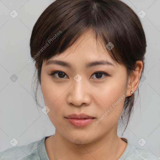 Neutral asian young-adult female with medium  brown hair and brown eyes