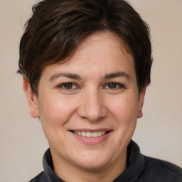 Joyful white adult female with short  brown hair and brown eyes