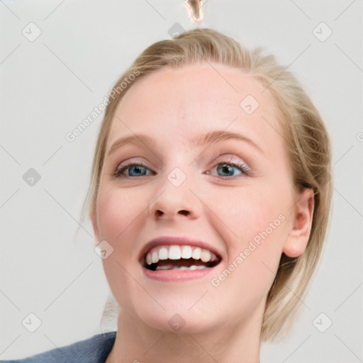 Joyful white young-adult female with medium  brown hair and blue eyes