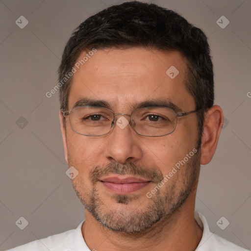 Joyful white adult male with short  brown hair and brown eyes