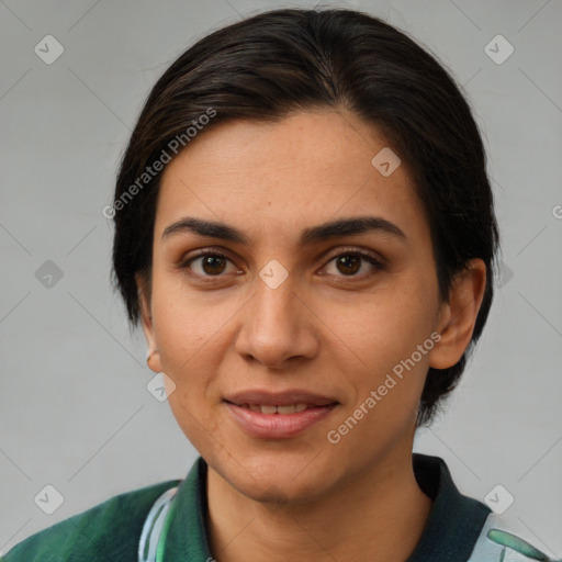 Joyful white young-adult female with medium  brown hair and brown eyes