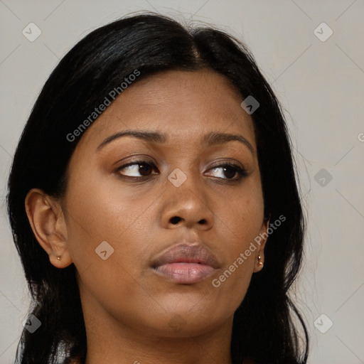 Neutral black young-adult female with medium  brown hair and brown eyes