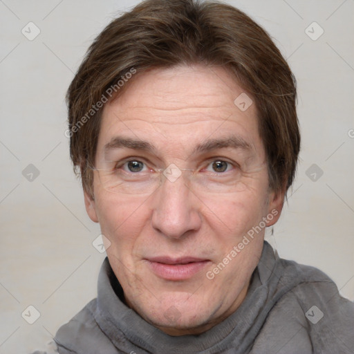 Joyful white adult male with short  brown hair and grey eyes