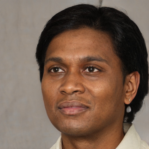 Neutral black adult male with short  black hair and brown eyes