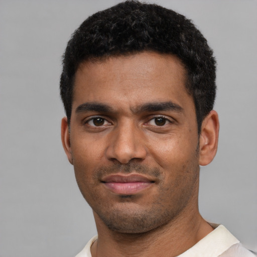 Neutral black young-adult male with short  black hair and brown eyes
