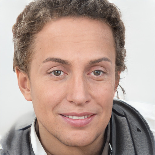 Joyful white adult female with short  brown hair and grey eyes