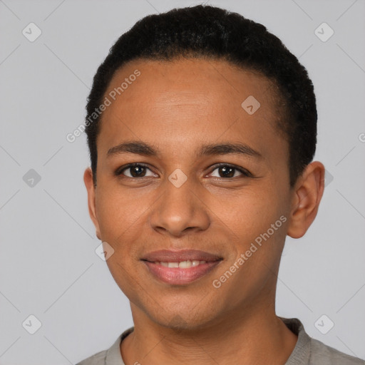 Joyful black young-adult male with short  black hair and brown eyes