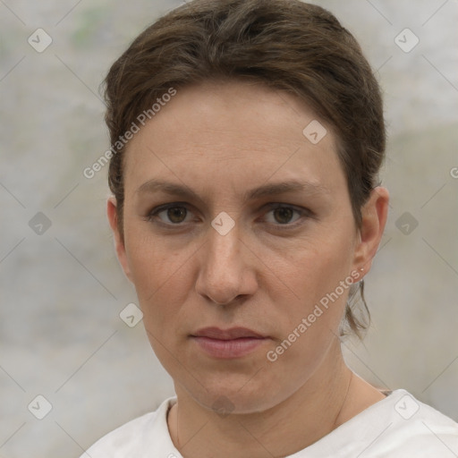 Joyful white adult female with short  brown hair and brown eyes