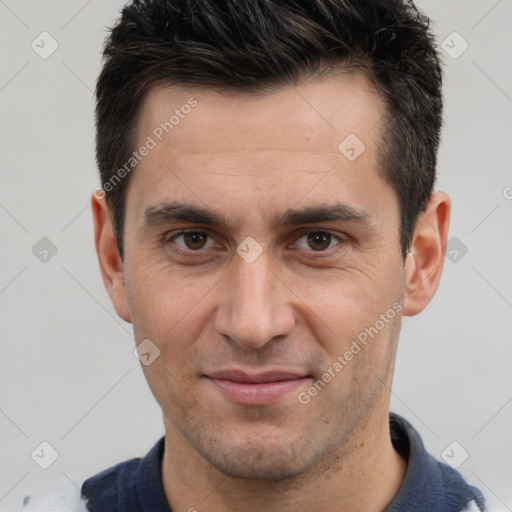 Joyful white adult male with short  brown hair and brown eyes