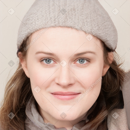 Joyful white young-adult female with medium  brown hair and blue eyes