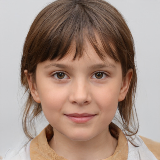 Joyful white child female with medium  brown hair and brown eyes