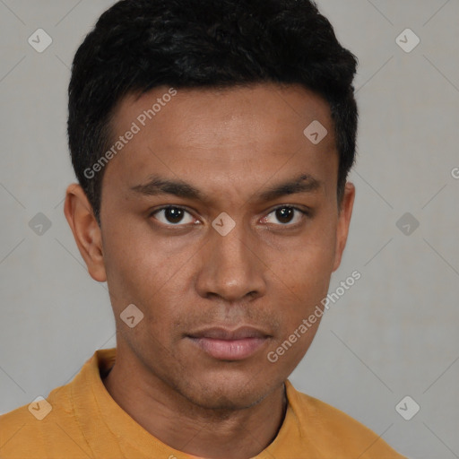 Neutral latino young-adult male with short  brown hair and brown eyes