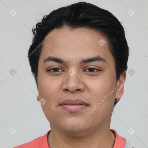 Joyful latino young-adult male with short  black hair and brown eyes