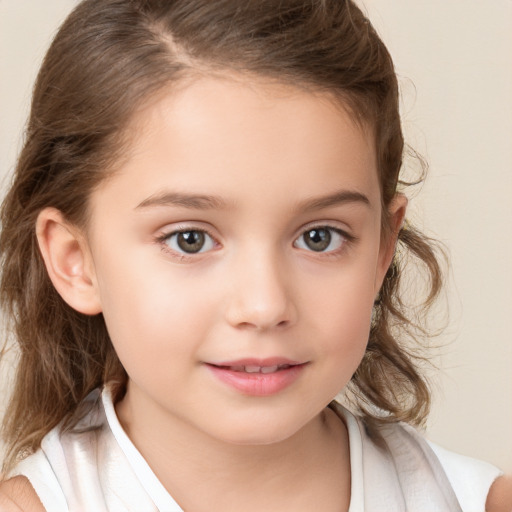 Joyful white child female with medium  brown hair and brown eyes