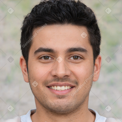 Joyful white young-adult male with short  black hair and brown eyes