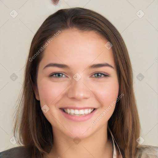 Joyful white young-adult female with long  brown hair and blue eyes