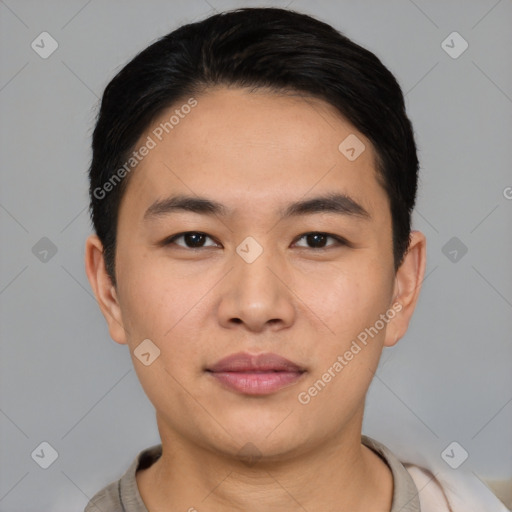 Joyful asian young-adult male with short  black hair and brown eyes