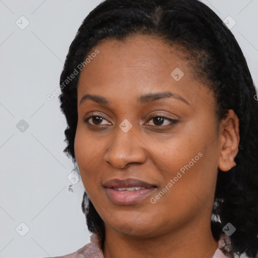 Joyful black young-adult female with medium  black hair and brown eyes