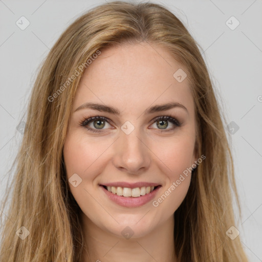 Joyful white young-adult female with long  brown hair and green eyes