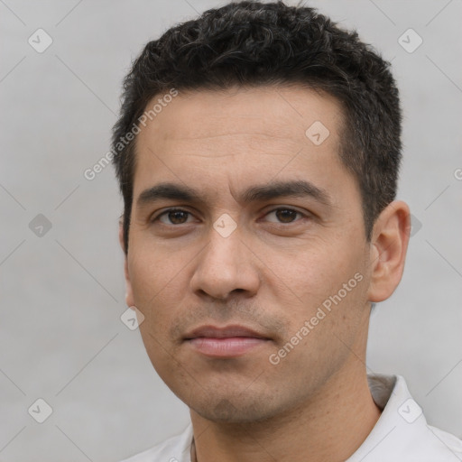 Neutral white young-adult male with short  black hair and brown eyes