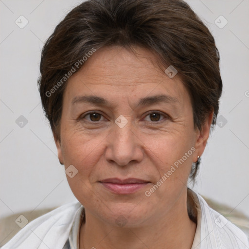 Joyful white adult female with short  brown hair and brown eyes