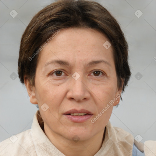 Joyful white adult female with short  brown hair and brown eyes