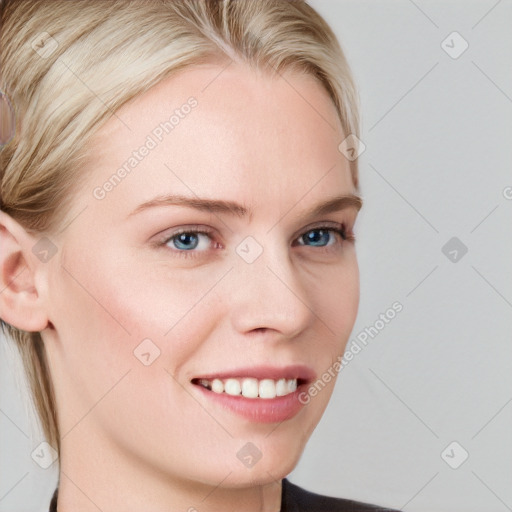 Joyful white young-adult female with medium  brown hair and blue eyes