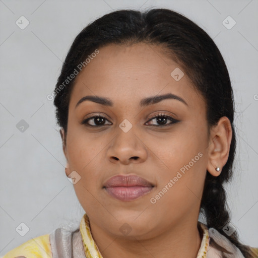 Joyful latino young-adult female with medium  brown hair and brown eyes