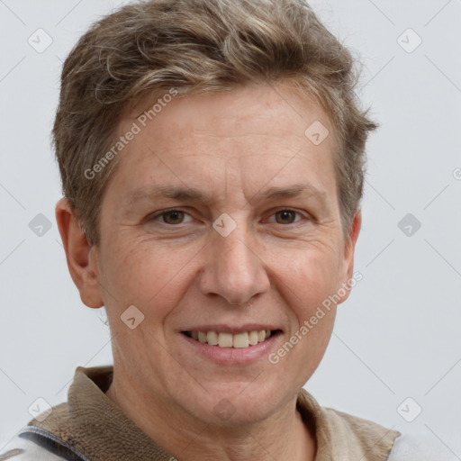 Joyful white adult male with short  brown hair and grey eyes