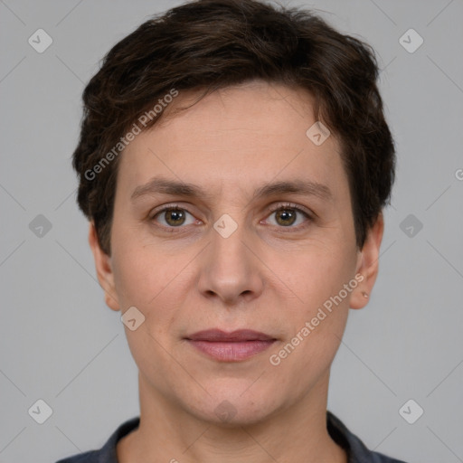 Joyful white adult female with short  brown hair and brown eyes