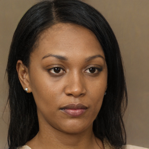 Neutral black young-adult female with long  brown hair and brown eyes