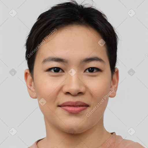 Joyful asian young-adult female with short  black hair and brown eyes