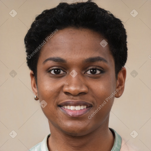 Joyful black young-adult female with short  black hair and brown eyes