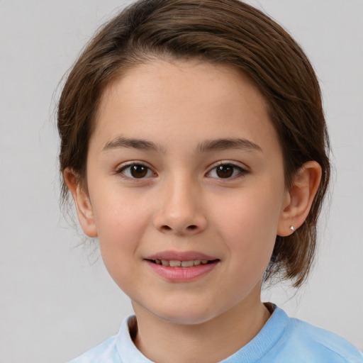 Joyful white child female with medium  brown hair and brown eyes