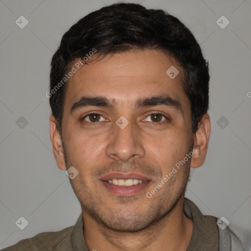 Joyful white young-adult male with short  black hair and brown eyes