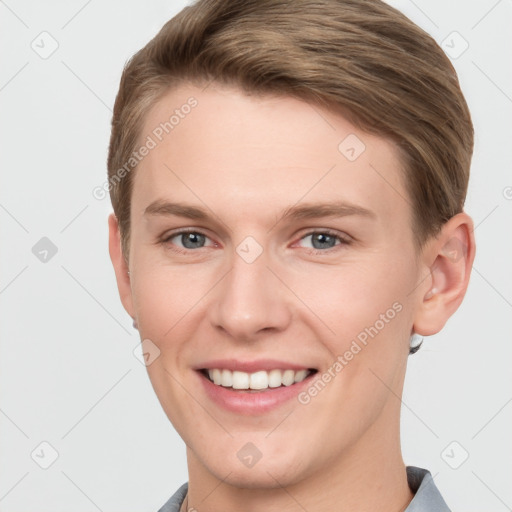 Joyful white young-adult female with short  brown hair and grey eyes