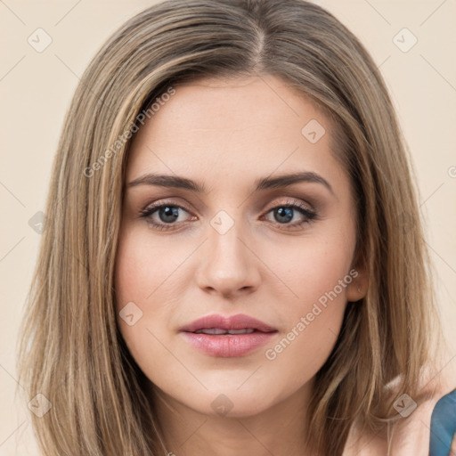 Joyful white young-adult female with long  brown hair and green eyes