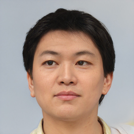 Neutral asian young-adult male with short  brown hair and brown eyes