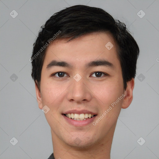 Joyful white young-adult male with short  black hair and brown eyes